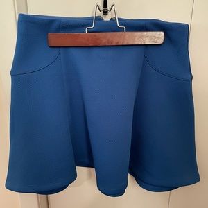 Bebe blue flare mini skirt